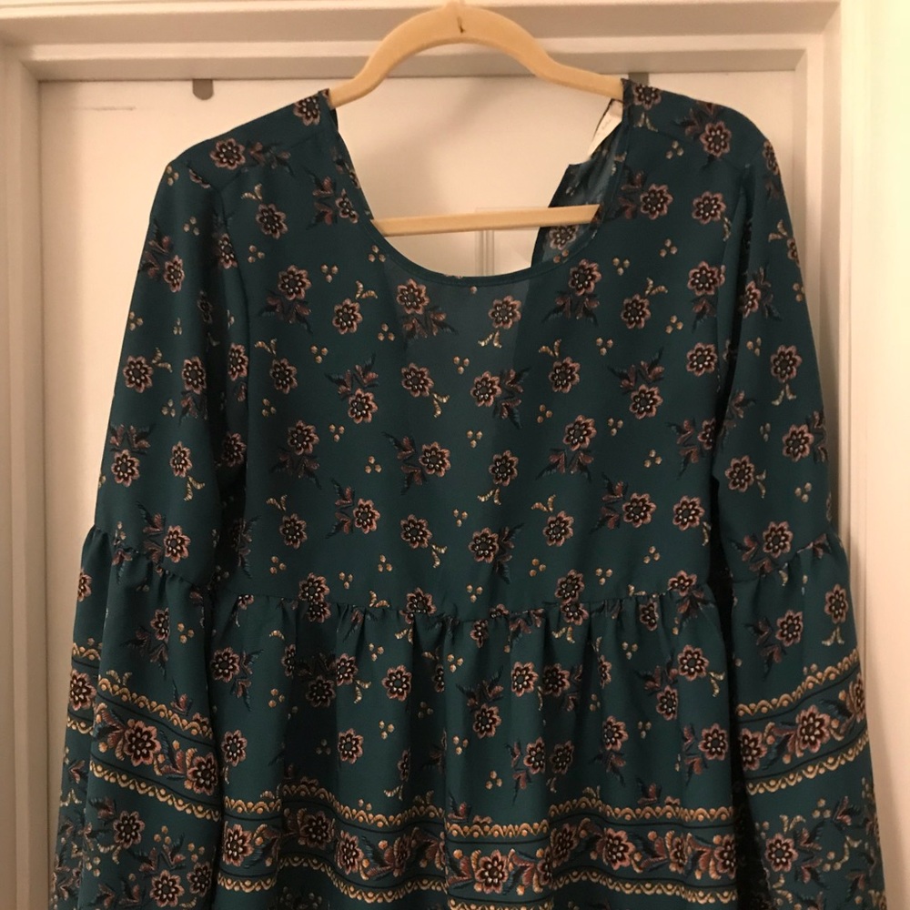 Open back, bell sleeve, babydoll blouse!